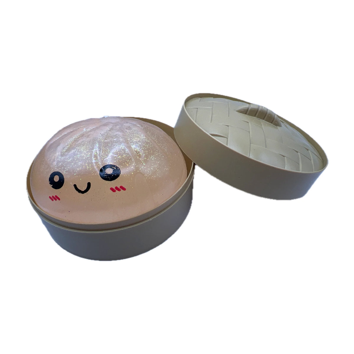 Squishy antiestres steamed bun color salmon en su vaporera de juguete