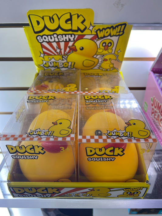 Exhibidor Duck Squishy jumbo con 4 patos en sus cajas transparentes