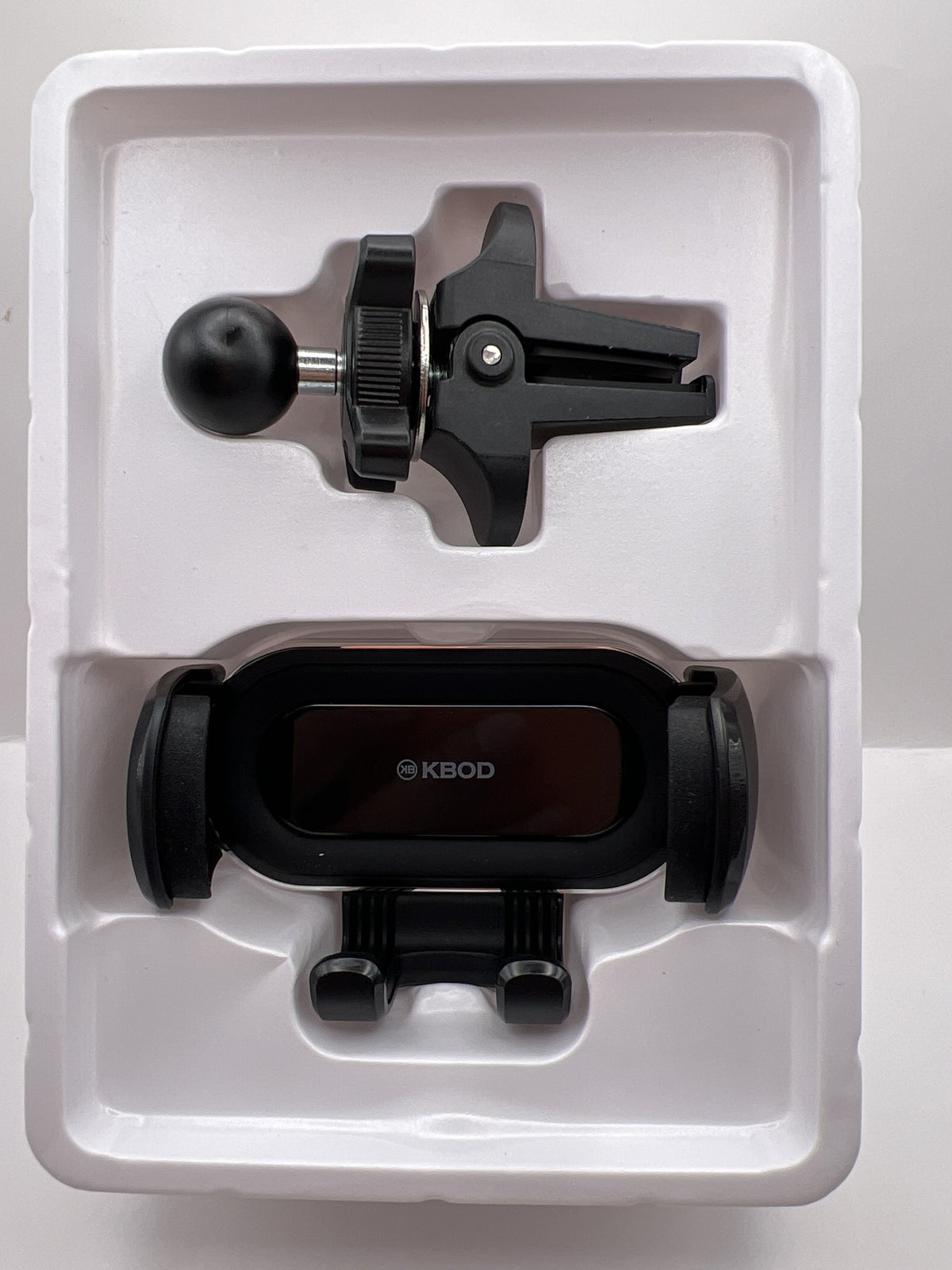 Contenido de la caja del KBOD H32: holder y clip de rejilla
