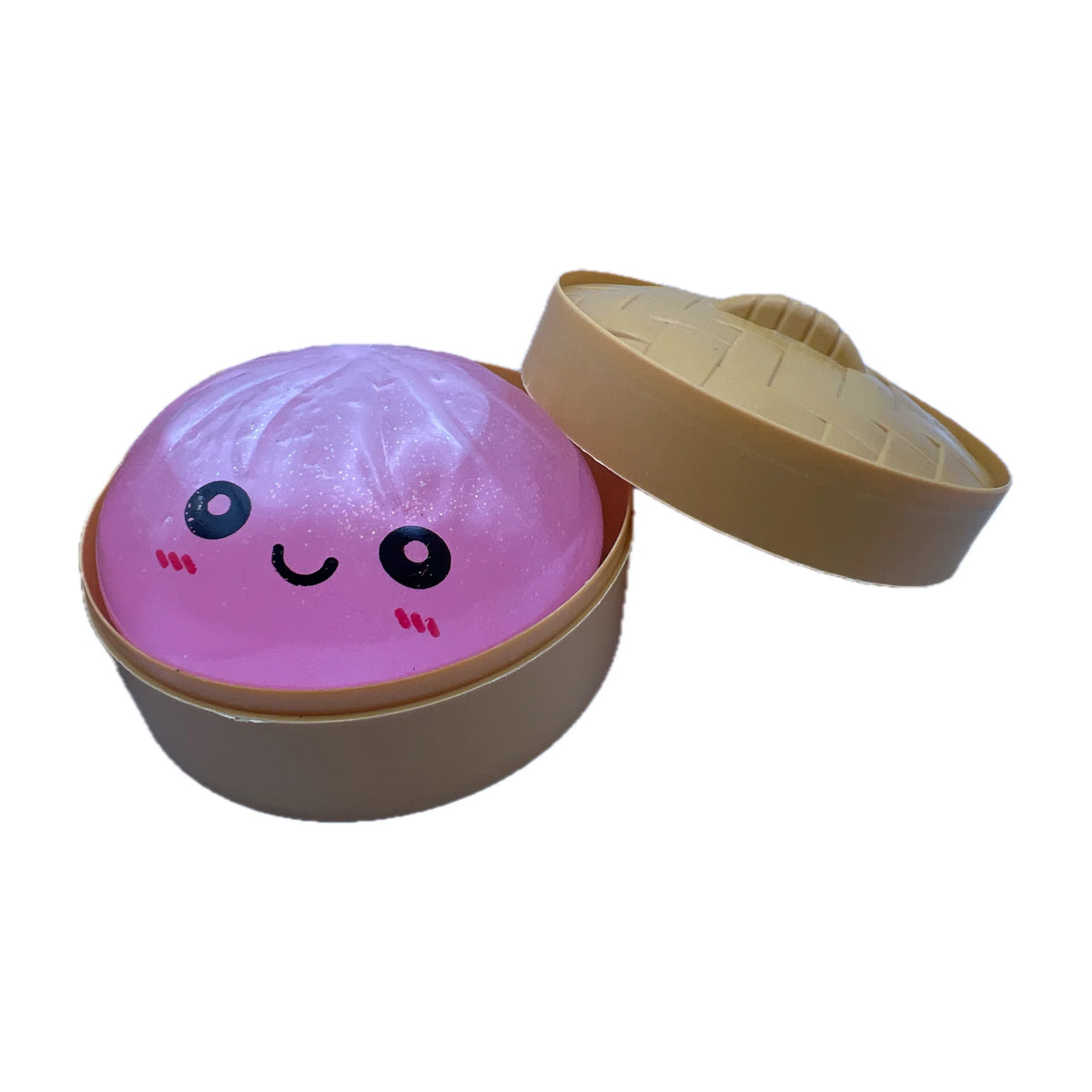 Squishy antiestres steamed bun color rosa en su vaporera de juguete