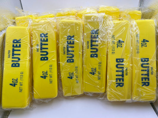 Barras de squishy de mantequilla dentro de su caja — foto real del producto