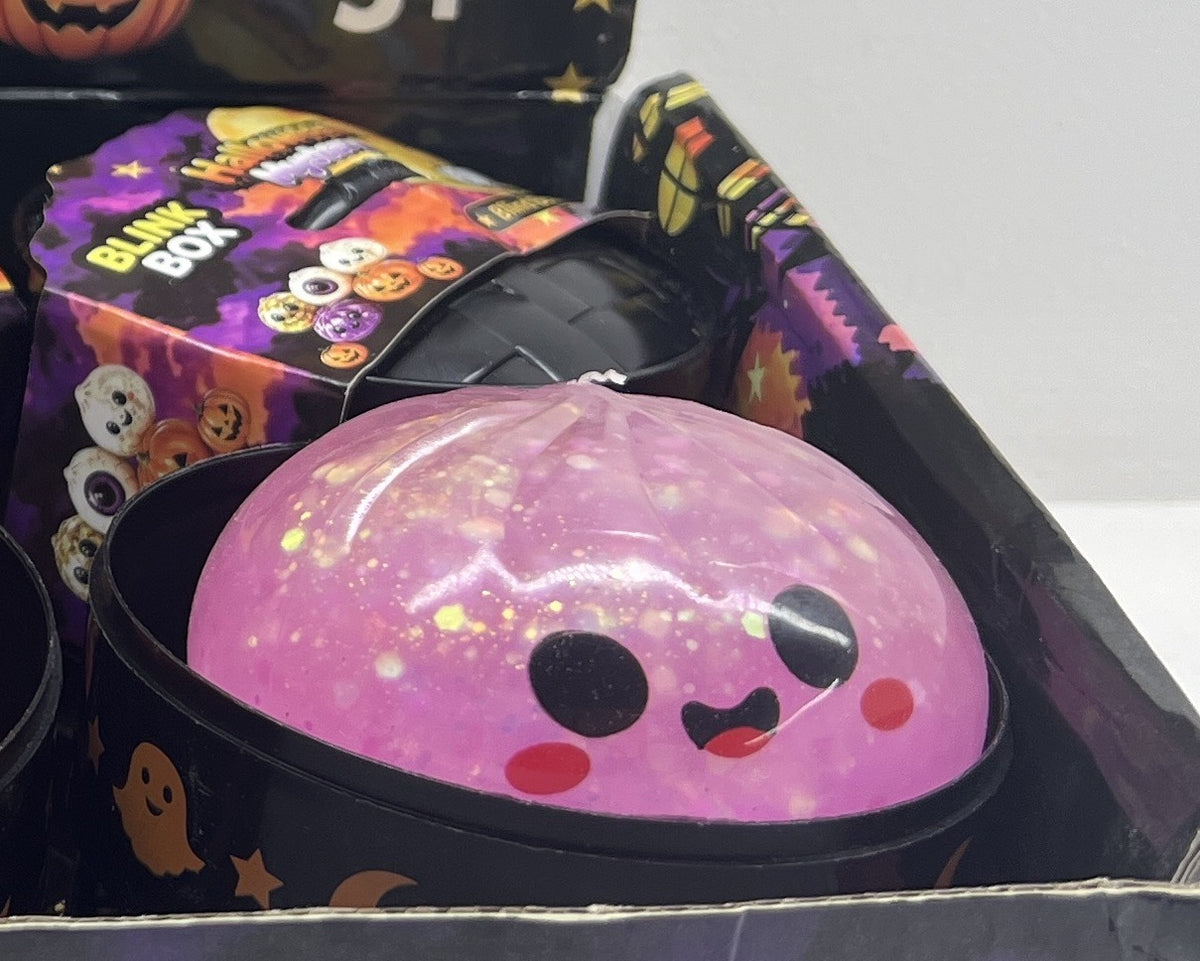 Squishy dumpling Halloween carita kawaii rosa con glitter en su lata (ejemplo de diseno)