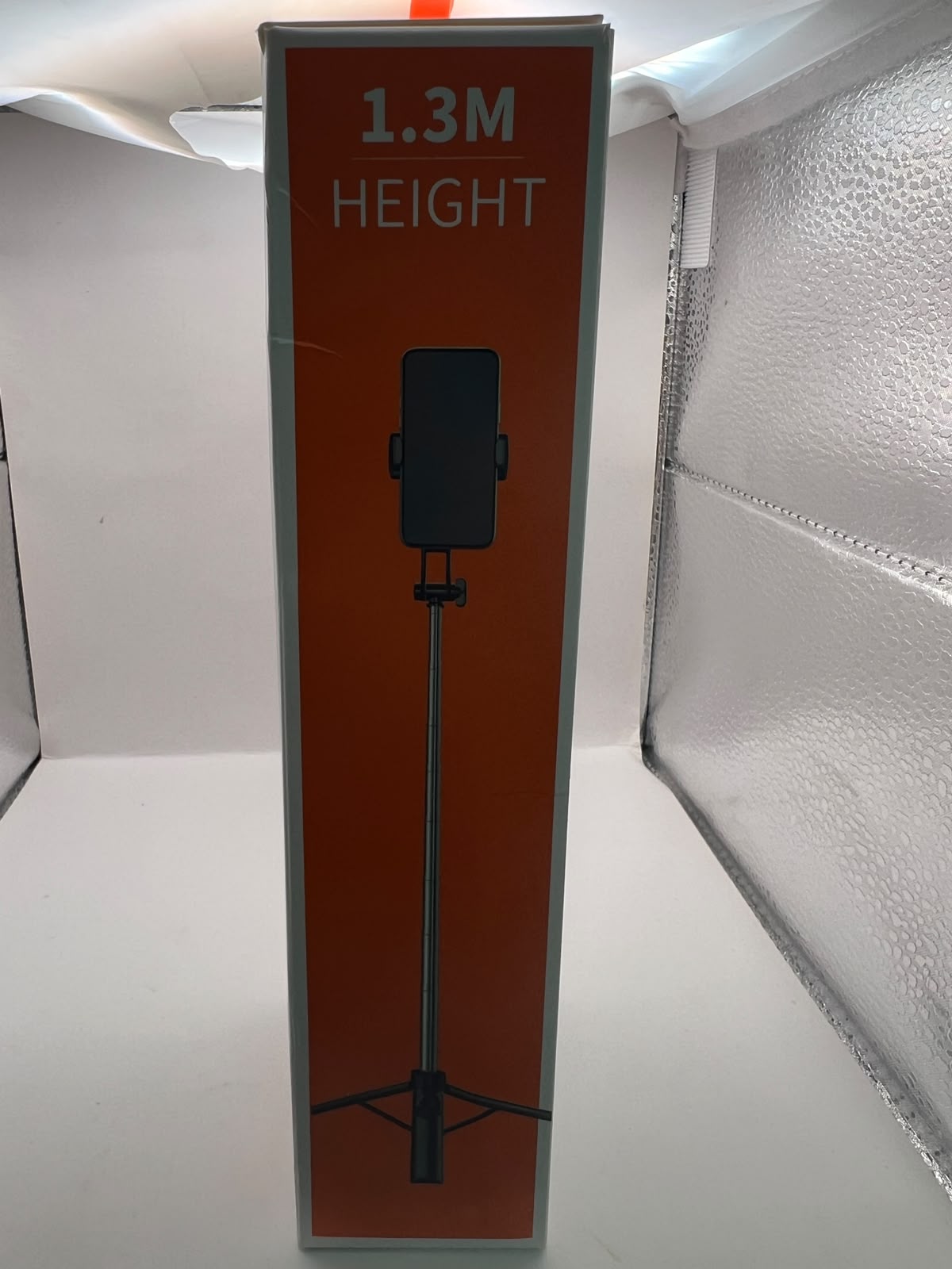 Empaque y producto del tripié selfie VMEX VZJ-17 1.3 m