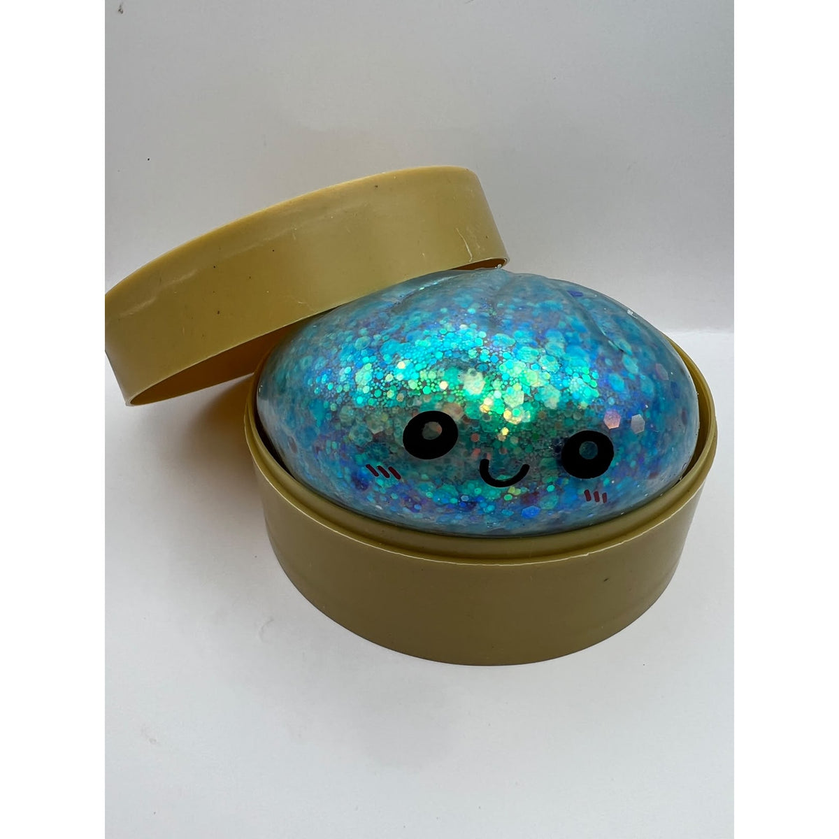 Squishy Bun Antiestrés color Glitter Azul — foto real del producto