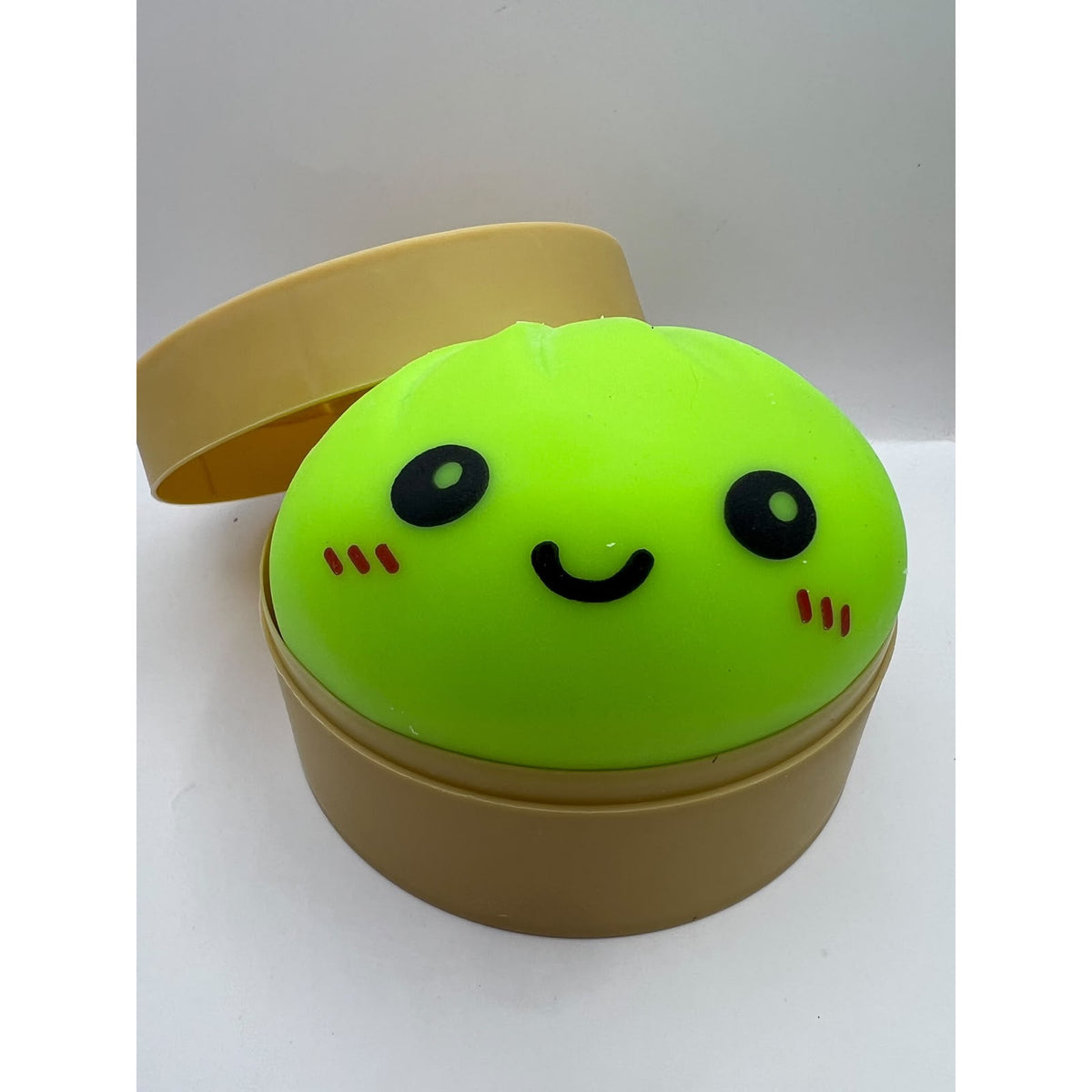 Squishy Bun Antiestrés color Sugar Verde Neon — foto real del producto